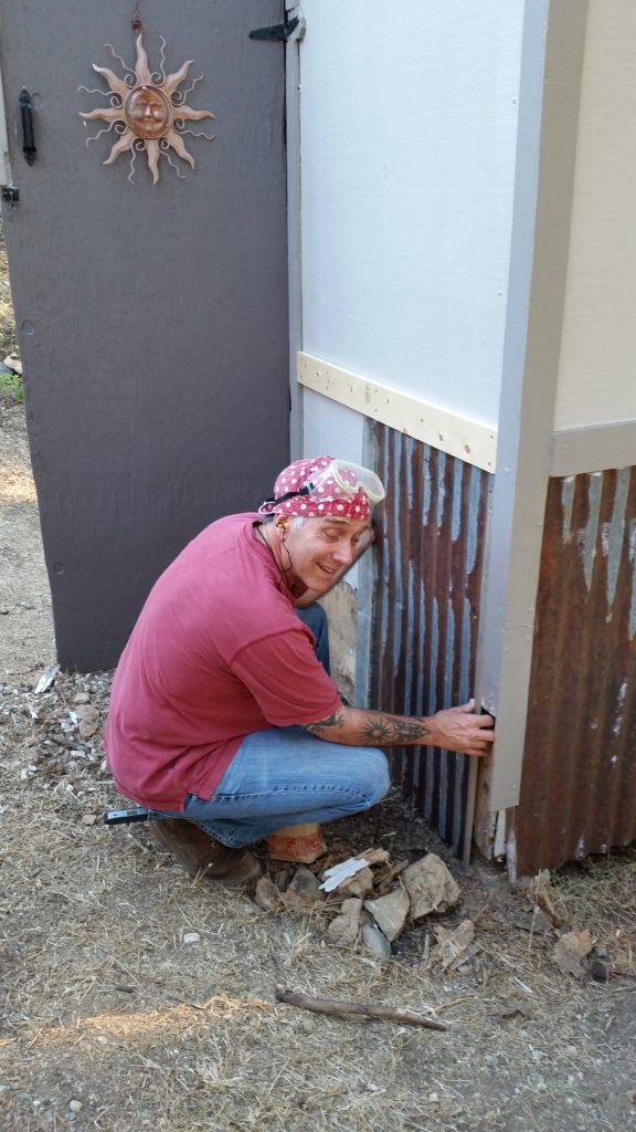 Adding wood trim and corrugated metal